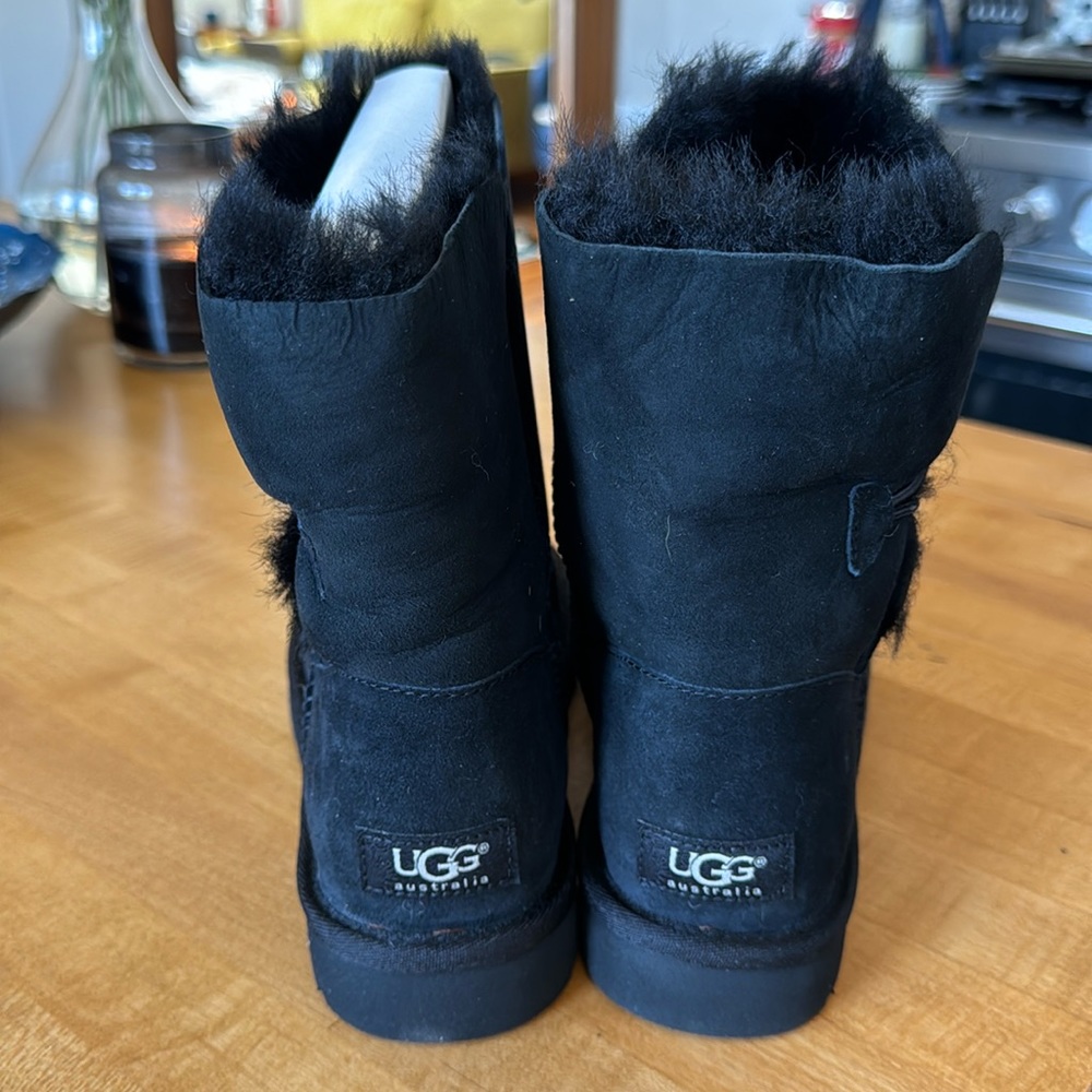 Brand New Women’s Black Ugg Boots with side Button.